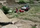 VIDEO| S-au răsturnat cu mașina în canal.Un mort și un rănit